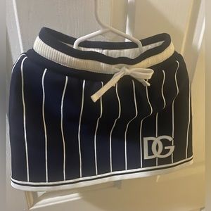 Dolce & Gabbana girls skirt striped blue multi. With logo on the skirt.